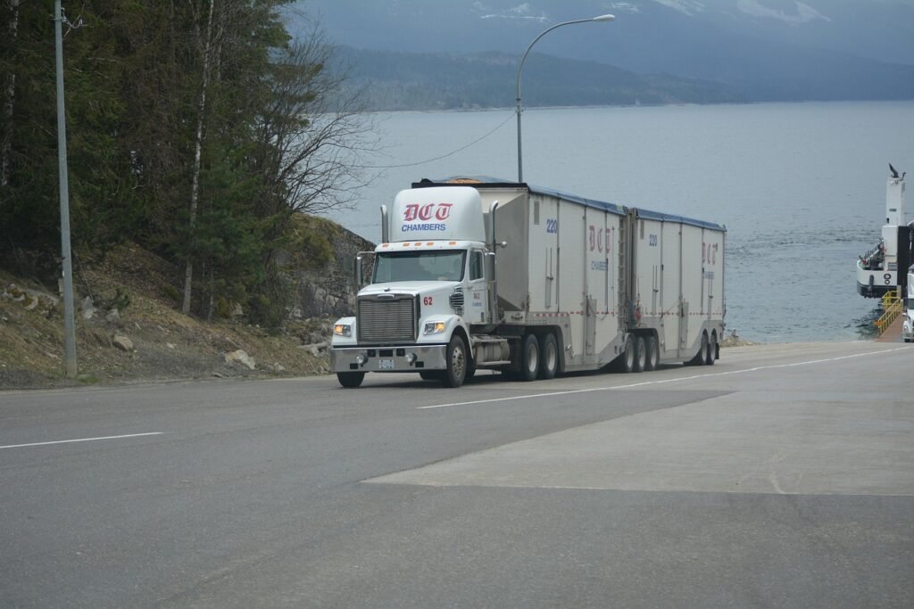 truck, lorry, white truck, cargo truck, big rig, transportation, vehicle, highway, lake, driving, truck drivers, truckers, nature, lorry driver, gray truck